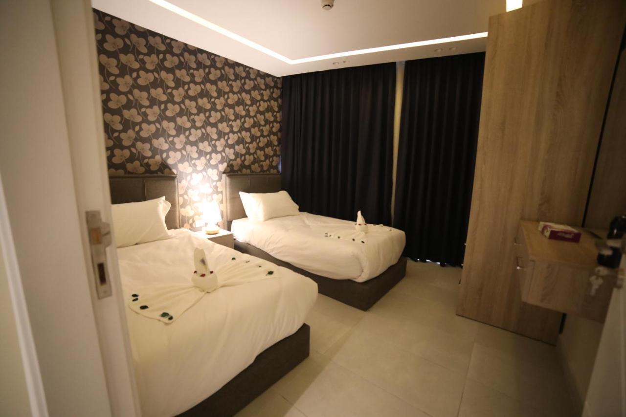 فندق صحارى الخليج Sahara Gulf Hotel Apartments Amman Exterior foto